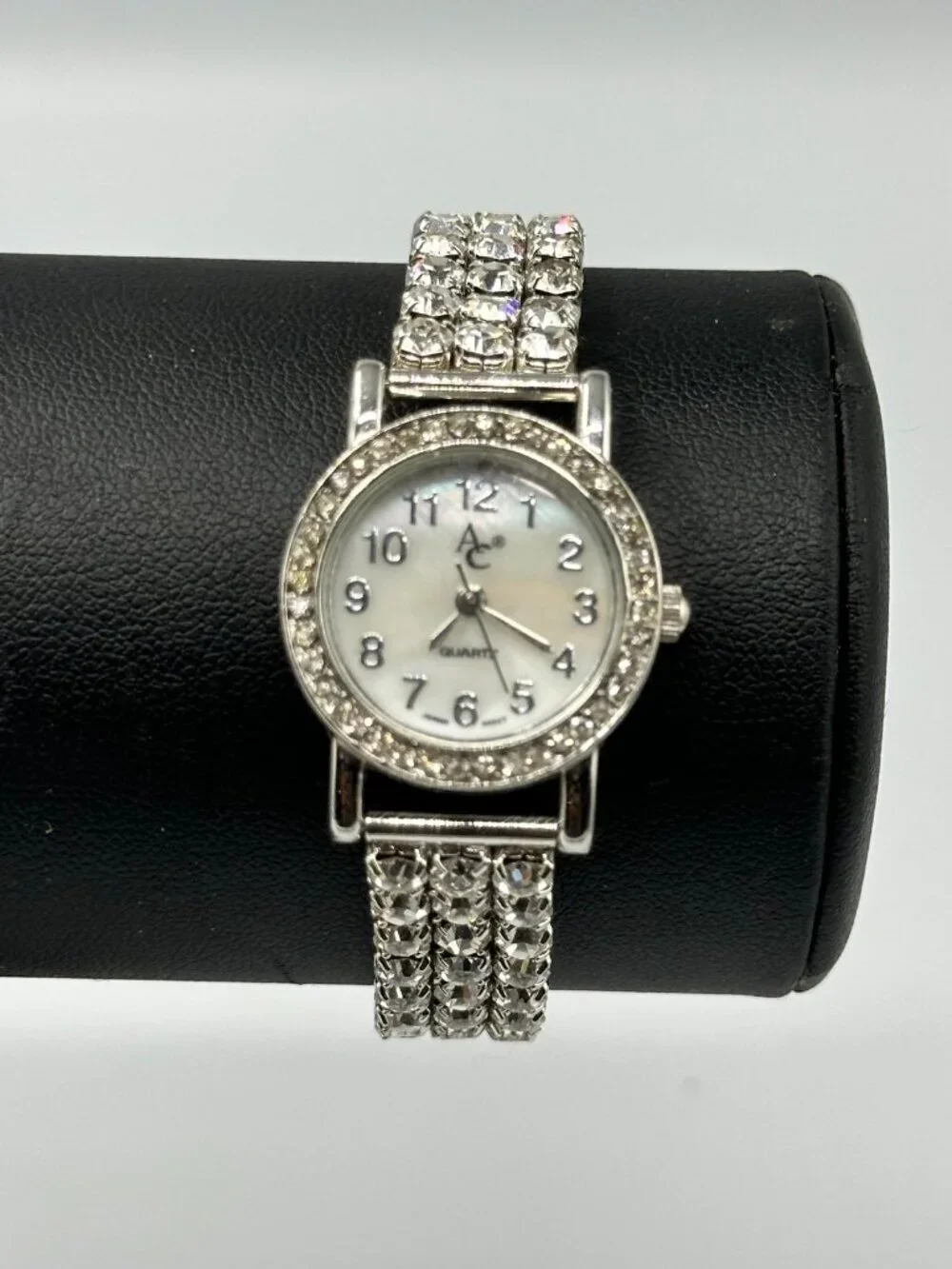 Rhinestone Watch Women Silver Tone Mother of Pearl Dial Stretch New Battery 6.5